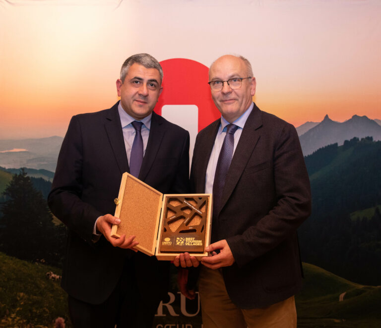 Secretary-General with the mayor of Gruyères during his visit to the village on February 2022