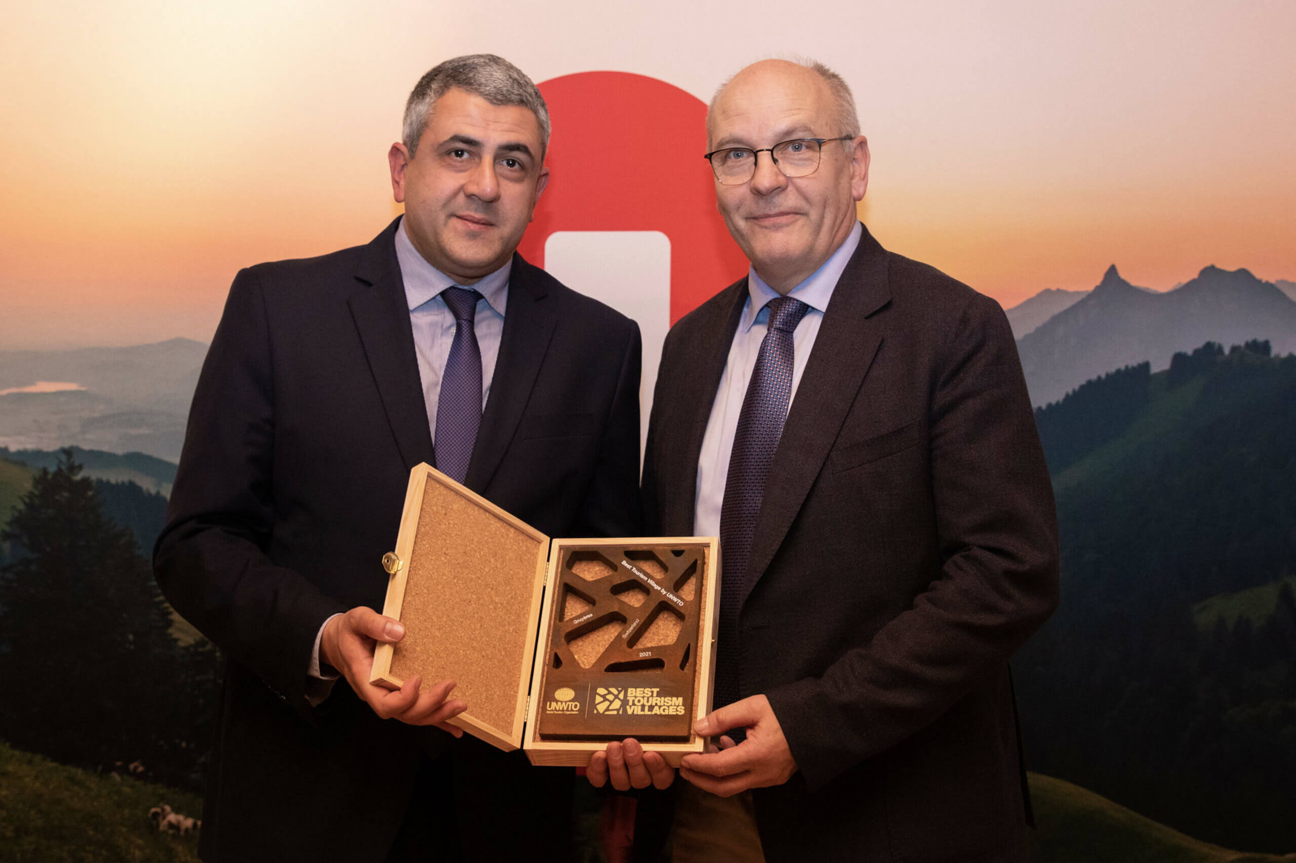 Secretary General with the mayor of Gruyères during his visit to the village on February 2022